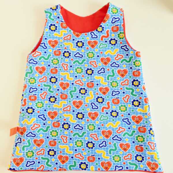 ABITO REVERSIBILE ARANCIO interno simboli celesti - immagine 2